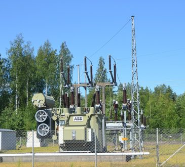 High-voltage power lines carrying electricity across the landscape