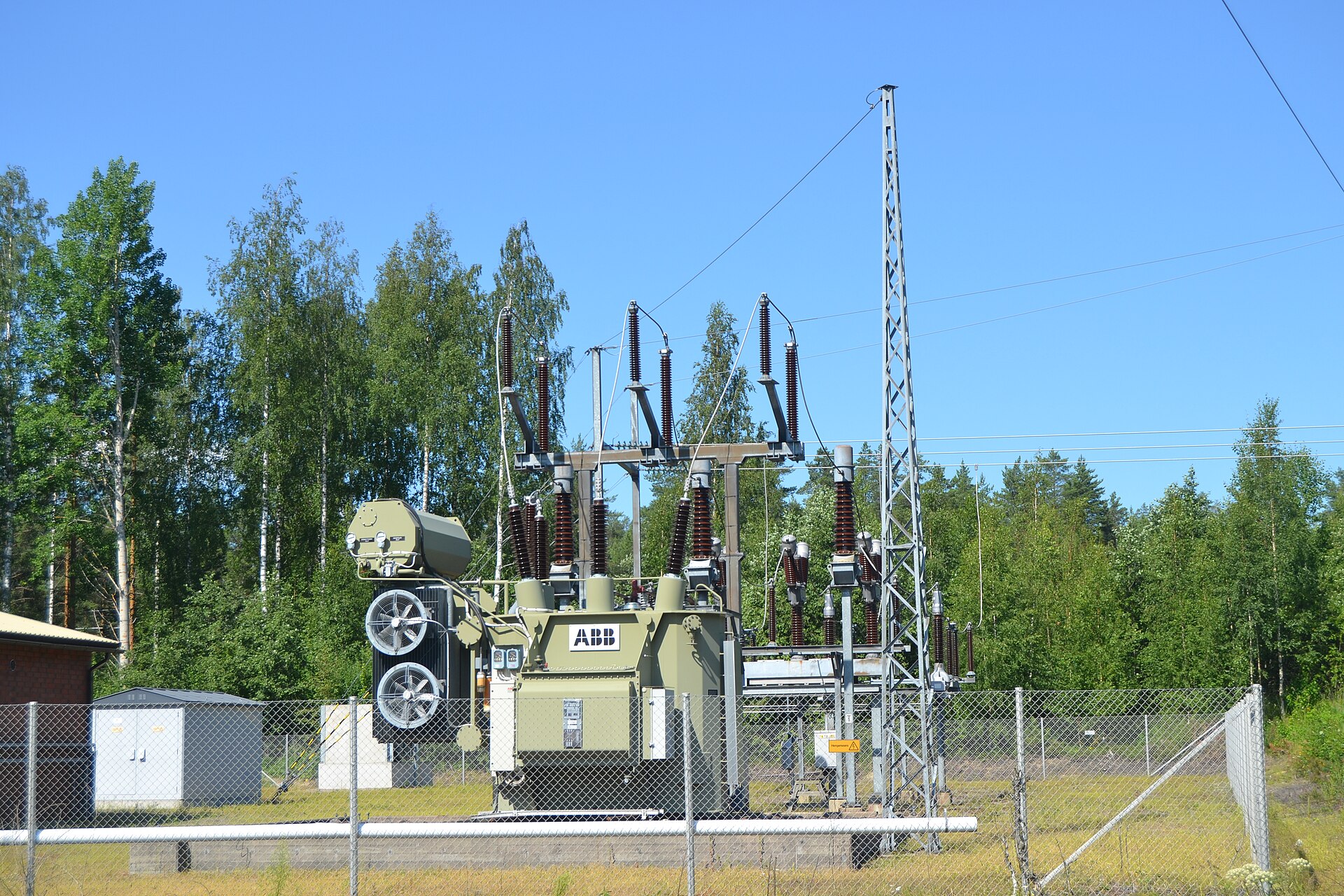 High-voltage power lines carrying electricity across the landscape